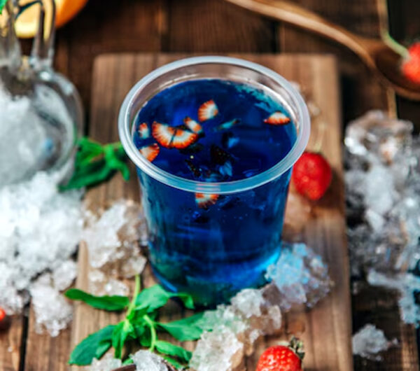 Blue Moon (malibu Rum, Blue Curacao, Ginger Ale Bitters, Maraschino Cherry)